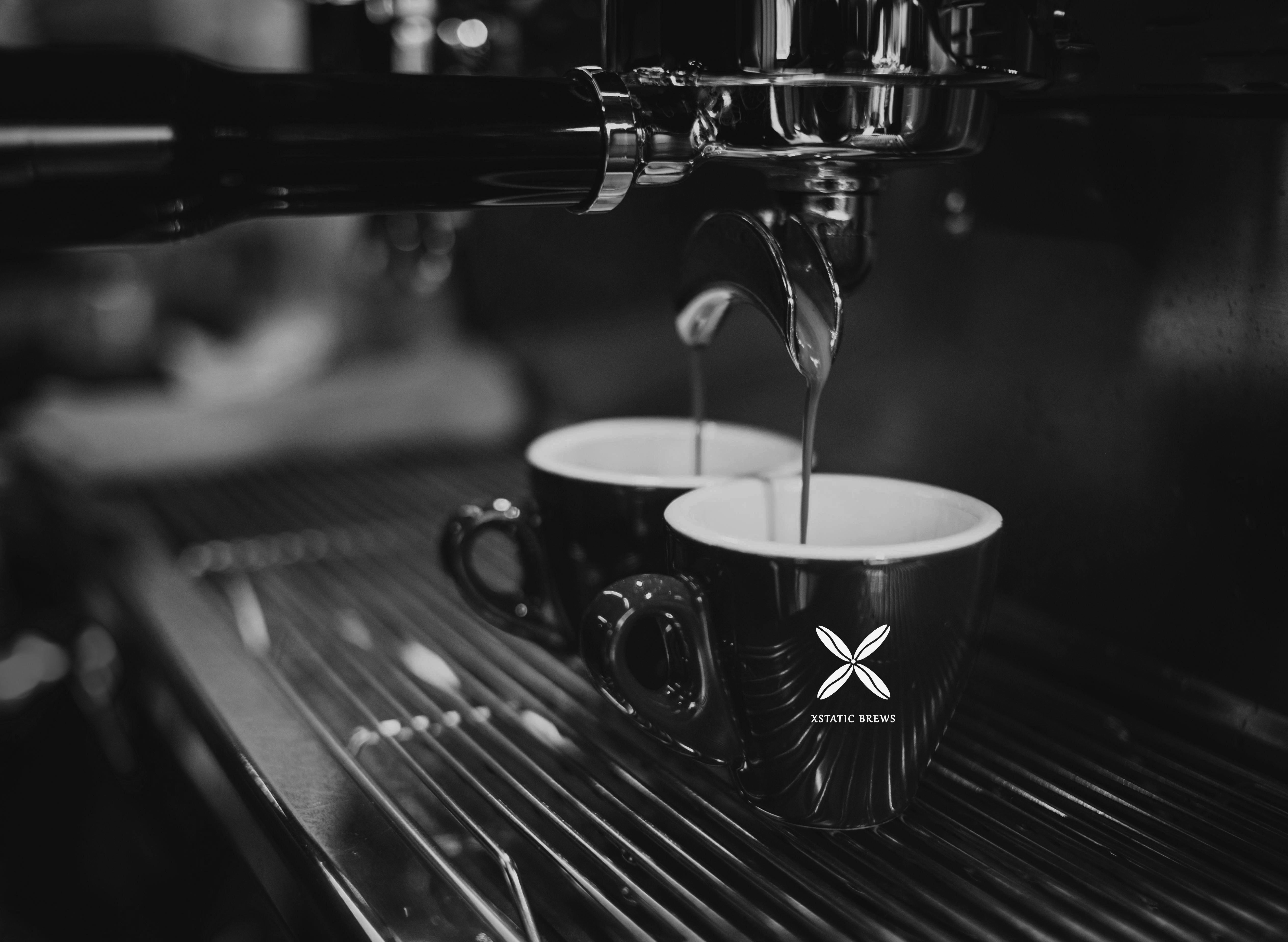 Coffee pouring into an Xstatic Brew Cup.